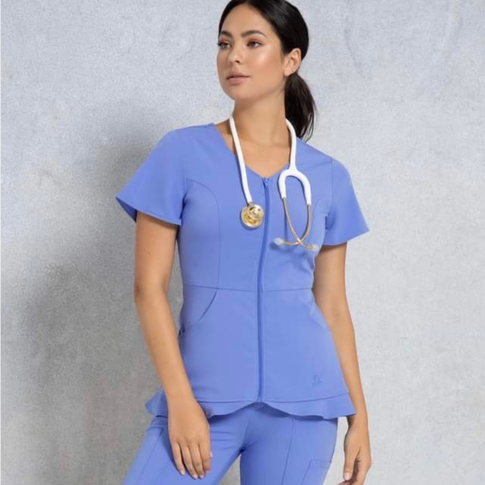 Jaanuu Hudson Collection Ruffle Hem Top in Ceil Blue